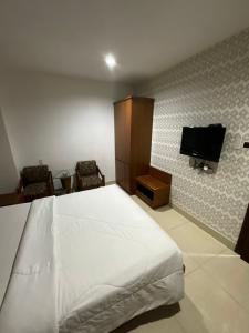 TV a/nebo společenská místnost v ubytování Bunny - Valentine Hotel - Bui Vien Street
