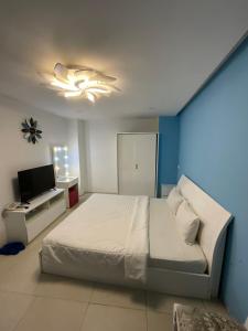 Postel nebo postele na pokoji v ubytování Bunny - Valentine Hotel - Bui Vien Street