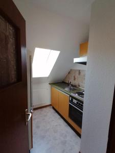 Η κουζίνα ή μικρή κουζίνα στο Ferienwohnung im Oberharz +4 φωτογραφίες