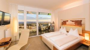Postel nebo postele na pokoji v ubytování Hotel AVIVA - für Singles & Alleinreisende