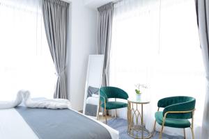 Postel nebo postele na pokoji v ubytování Bahar JBR Apartment by HAPPY SEASON