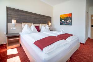 Krevet ili kreveti u jedinici u objektu Hotel Marc Aurel