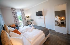 Krevet ili kreveti u jedinici u objektu Hotel Marc Aurel