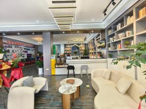 Istumisnurk majutusasutuses Zhangjiajie Borui Hotel - Tianmen Mountain 张家界天门山泊睿庭院酒店