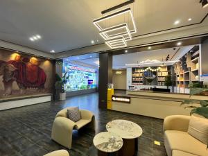 Istumisnurk majutusasutuses Zhangjiajie Borui Hotel - Tianmen Mountain 张家界天门山泊睿庭院酒店