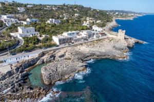 an aerial view of a rocky island in the ocean at Casa vacanze Calliope in Tricase