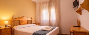 Posteľ alebo postele v izbe v ubytovaní Hostal Valdepeñas by Bossh! Hotels
