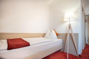Krevet ili kreveti u jedinici u objektu Hotel Marc Aurel
