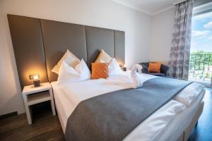 Krevet ili kreveti u jedinici u objektu Hotel Marc Aurel