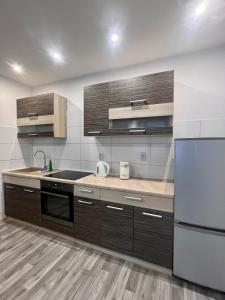 Η κουζίνα ή μικρή κουζίνα στο Apartamenty w Poznaniu