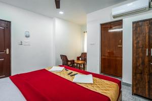 Postel nebo postele na pokoji v ubytování French Park Inn