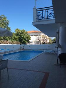 Bazén v ubytování Ifigenia Hotel nebo v jeho okolí