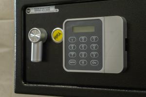 a close up of a cell phone with a key at Apartamentos La Ruta in Calpe