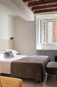 Posteľ alebo postele v izbe v ubytovaní Casa Pietra