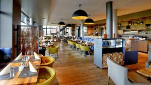 Restoran või mõni muu söögikoht majutusasutuses Elbstrand Resort Krautsand - Hotel Elbstrand