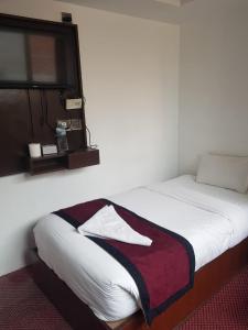 Letto o letti in una camera di Hotel de Universal