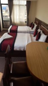 Letto o letti in una camera di Hotel de Universal