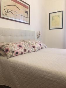 Postel nebo postele na pokoji v ubytování Marie Home Florence