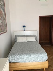 מיטה או מיטות בחדר ב-Marie Home Florence