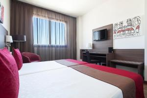 Postel nebo postele na pokoji v ubytování Hotel Best 4 Barcelona