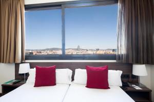 Postel nebo postele na pokoji v ubytování Hotel Best 4 Barcelona