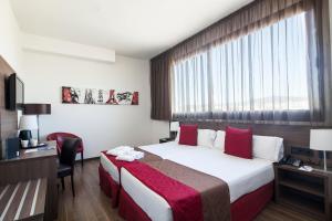Postel nebo postele na pokoji v ubytování Hotel Best 4 Barcelona