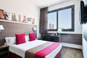 Postel nebo postele na pokoji v ubytování Hotel Best 4 Barcelona