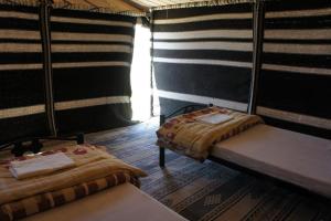 Posteľ alebo postele v izbe v ubytovaní Dana Village Camp-Wadi Dana Eco camp