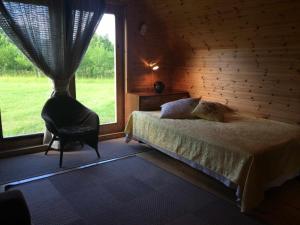 Postel nebo postele na pokoji v ubytování Käspri Farmstay + 37 fotografií