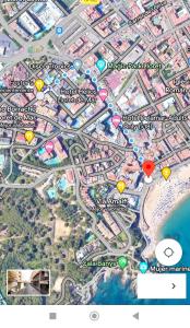 Un mapa de una ciudad con indicadores. en THE ROOM - APARTMENT IN LLORET en Lloret de Mar