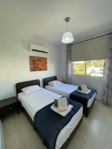Ένα ή περισσότερα κρεβάτια σε δωμάτιο στο Serenity Corner +90 φωτογραφίες