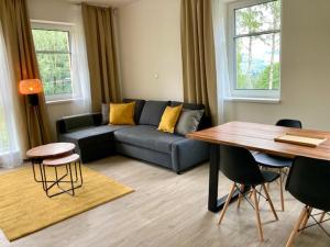 Posezení v ubytování Apartmán SIX v Resortu pod Špičákem