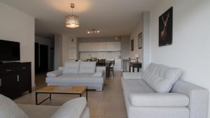 Posezení v ubytování Apartamenty Sun & Snow Bukowa Góra