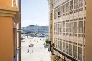 a view of a city from a building at Lux Maria Pita Corazon de Coruña in A Coruña