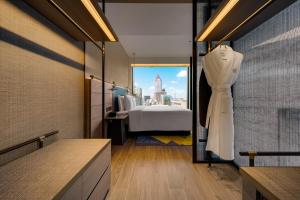 Letto o letti in una camera di Hotel Resonance Taipei, Tapestry Collection by Hilton