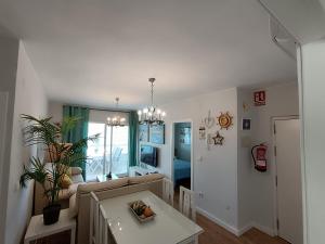 TV a/nebo společenská místnost v ubytování Villablanca Apartamento