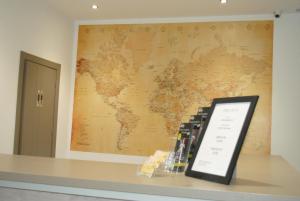 a map of the world on a wall at Fuencarral Rooms in Madrid