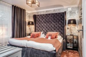 Postel nebo postele na pokoji v ubytování Högbo Brukshotell & Spa