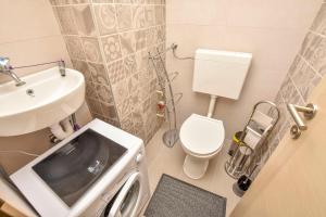 Koupelna v ubytování Apartments Vongola + 17 fotografií