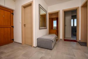 Postel nebo postele na pokoji v ubytování Apartments Vongola