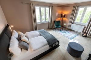 Postel nebo postele na pokoji v ubytování PRIMERA Zimmer mit Gemeinschaftsbad