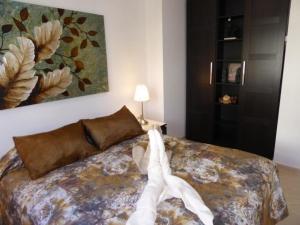 Posteľ alebo postele v izbe v ubytovaní Dalí Apartment