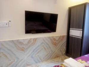 TV a/nebo společenská místnost v ubytování An Chi Hotel + 19 fotografií