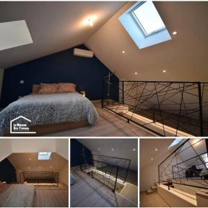 a bedroom with a bed and a skylight at Les Lunetiers in Champagnole