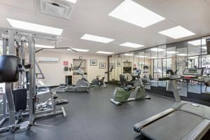 a gym with several treadmills and elliptical machines at Best Western Plus Inn of Williams in Williams