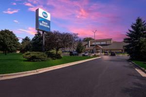 a sign for a west virginia motel on a street at Best Western Germantown Inn in Germantown