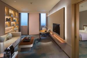 TV o dispositivi per l'intrattenimento presso Hilton Quanzhou Riverside