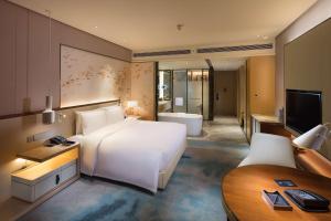 TV o dispositivi per l'intrattenimento presso Hilton Quanzhou Riverside