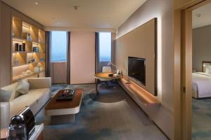 TV o dispositivi per l'intrattenimento presso Hilton Quanzhou Riverside