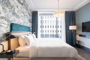Postel nebo postele na pokoji v ubytování Radisson Blu Hotel, Glasgow